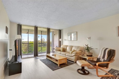 BEAUTIFUL 2/2 CONDO ON DESIRABLE TOP FLOOR WITH GORGEOUS VIEW OF on Inverrary Country Club in Florida - for sale on GolfHomes.com, golf home, golf lot