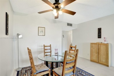 BEAUTIFUL 2/2 CONDO ON DESIRABLE TOP FLOOR WITH GORGEOUS VIEW OF on Inverrary Country Club in Florida - for sale on GolfHomes.com, golf home, golf lot