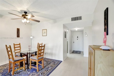 BEAUTIFUL 2/2 CONDO ON DESIRABLE TOP FLOOR WITH GORGEOUS VIEW OF on Inverrary Country Club in Florida - for sale on GolfHomes.com, golf home, golf lot