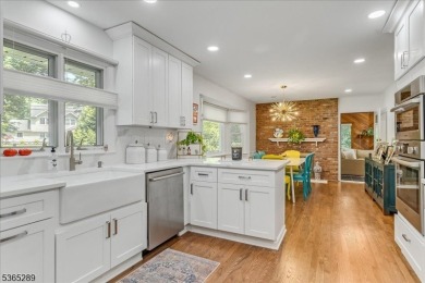 As you step inside, you're greeted by an inviting foyer that on Packanack Golf Club in New Jersey - for sale on GolfHomes.com, golf home, golf lot