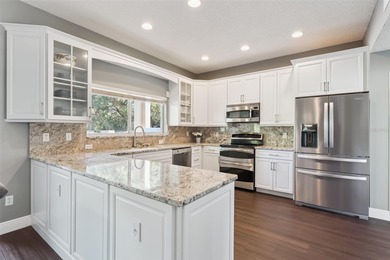 Welcome to this stunning 4-bedroom, 3-bathroom pool home in the on North Shore Golf Club in Florida - for sale on GolfHomes.com, golf home, golf lot