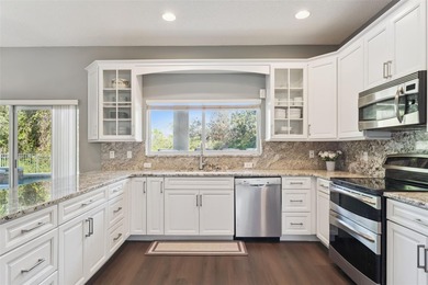 Welcome to this stunning 4-bedroom, 3-bathroom pool home in the on North Shore Golf Club in Florida - for sale on GolfHomes.com, golf home, golf lot