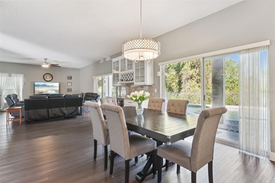 Welcome to this stunning 4-bedroom, 3-bathroom pool home in the on North Shore Golf Club in Florida - for sale on GolfHomes.com, golf home, golf lot