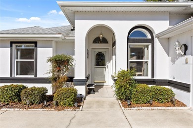 Discover the perfect blend of charm, comfort, and resort-style on Royal Oaks Golf Club in Florida - for sale on GolfHomes.com, golf home, golf lot