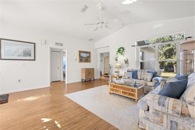 Discover the perfect blend of charm, comfort, and resort-style on Royal Oaks Golf Club in Florida - for sale on GolfHomes.com, golf home, golf lot