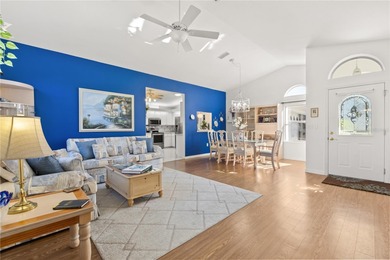 Discover the perfect blend of charm, comfort, and resort-style on Royal Oaks Golf Club in Florida - for sale on GolfHomes.com, golf home, golf lot