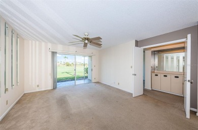 ** REDUCED PRICE ** Enjoy paradise in this comfortable on Isla Del Sol Yacht and Country Club in Florida - for sale on GolfHomes.com, golf home, golf lot
