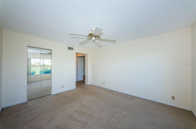 ** REDUCED PRICE ** Enjoy paradise in this comfortable on Isla Del Sol Yacht and Country Club in Florida - for sale on GolfHomes.com, golf home, golf lot