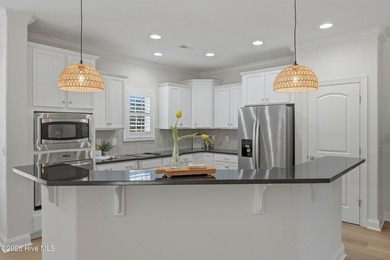 Welcome to 1162 Evangeline Drive. This 4 bedroom, 4 full bath on Cape Fear National At Brunswick Forest in North Carolina - for sale on GolfHomes.com, golf home, golf lot