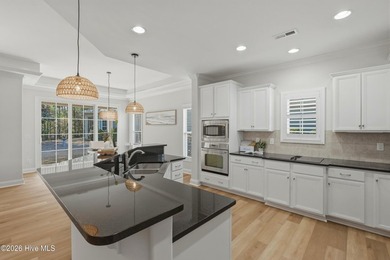 Welcome to 1162 Evangeline Drive. This 4 bedroom, 4 full bath on Cape Fear National At Brunswick Forest in North Carolina - for sale on GolfHomes.com, golf home, golf lot