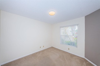 ** REDUCED PRICE ** Enjoy paradise in this comfortable on Isla Del Sol Yacht and Country Club in Florida - for sale on GolfHomes.com, golf home, golf lot