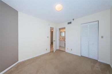 ** REDUCED PRICE ** Enjoy paradise in this comfortable on Isla Del Sol Yacht and Country Club in Florida - for sale on GolfHomes.com, golf home, golf lot