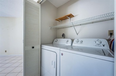 ** REDUCED PRICE ** Enjoy paradise in this comfortable on Isla Del Sol Yacht and Country Club in Florida - for sale on GolfHomes.com, golf home, golf lot