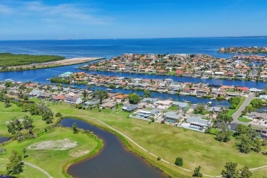 Welcome to Apollo Beach Living!
Nestled in the desirable Golf on Apollo Beach Golf and Sea Club in Florida - for sale on GolfHomes.com, golf home, golf lot