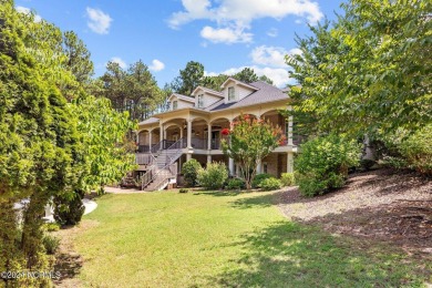 Nestled among almost 3 acres of longleaf pines, this exquisite on Pinewild Country Club of Pinehurst in North Carolina - for sale on GolfHomes.com, golf home, golf lot