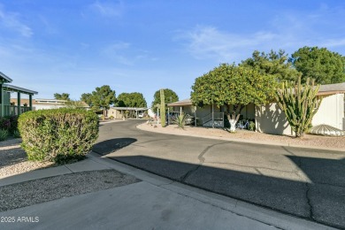 WELCOME TO THIS NICE 2040SQF HOME ON A SPACIOUS AND IDEAL CORNER on Paradise Peak Golf Course in Arizona - for sale on GolfHomes.com, golf home, golf lot