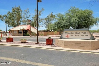 WOW! THIS 2040 SQ.FT. FURNISHED HOME ON A SPACIOUS AND IDEAL on Paradise Peak Golf Course in Arizona - for sale on GolfHomes.com, golf home, golf lot