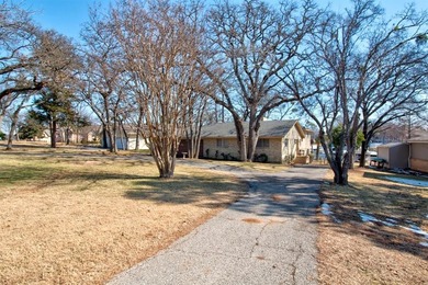 This well-built lakefront home on Lake Kiowa offers a versatile on Lake Kiowa Golf Course in Texas - for sale on GolfHomes.com, golf home, golf lot