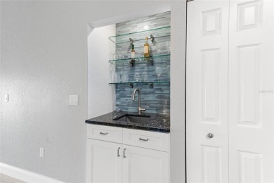 Only unit for sale with a dock! Sailboat water, no bridges to on Saint Andrews South Golf Club in Florida - for sale on GolfHomes.com, golf home, golf lot