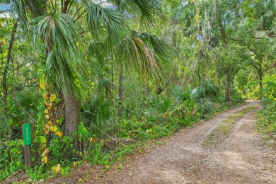 This expansive 3.68-acre property is a rare find in one of on Mayfair Country Club in Florida - for sale on GolfHomes.com, golf home, golf lot