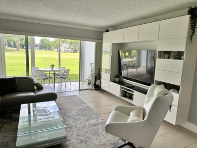 Sophisticated First-Floor Condo with Exceptional Golf view on Kings Point Golf -Flanders Way in Florida - for sale on GolfHomes.com, golf home, golf lot