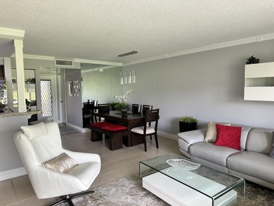 Sophisticated First-Floor Condo with Exceptional Golf view on Kings Point Golf -Flanders Way in Florida - for sale on GolfHomes.com, golf home, golf lot