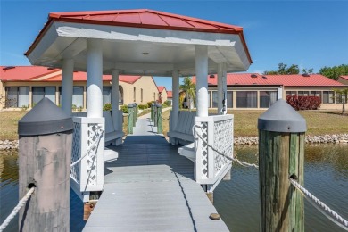 Only unit for sale with a dock! Sailboat water, no bridges to on Saint Andrews South Golf Club in Florida - for sale on GolfHomes.com, golf home, golf lot