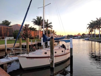 Only unit for sale with a dock! Sailboat water, no bridges to on Saint Andrews South Golf Club in Florida - for sale on GolfHomes.com, golf home, golf lot