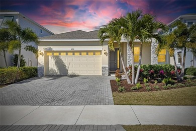 Under contract-accepting backup offers. 5235 Wishing Arch Dr on Apollo Beach Golf and Sea Club in Florida - for sale on GolfHomes.com, golf home, golf lot