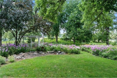 Golf course living meets modern comfort! Enjoy gorgeous gardens on Meadowbrook Golf Course in Minnesota - for sale on GolfHomes.com, golf home, golf lot