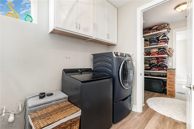 Views - Luxury Living - and Exceptional Upgrades! Stunning on Herons Glen Golf and Country Club in Florida - for sale on GolfHomes.com, golf home, golf lot