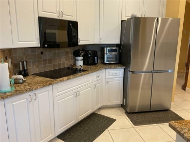 Welcome to Herons Glen. Enjoy this very large HERON IV model in on Herons Glen Golf and Country Club in Florida - for sale on GolfHomes.com, golf home, golf lot
