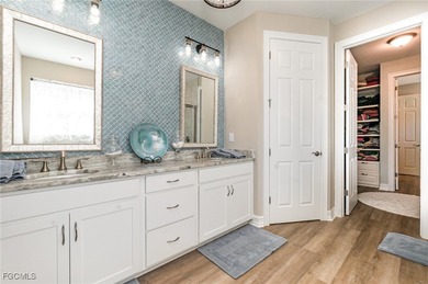 Views - Luxury Living - and Exceptional Upgrades! Stunning on Herons Glen Golf and Country Club in Florida - for sale on GolfHomes.com, golf home, golf lot