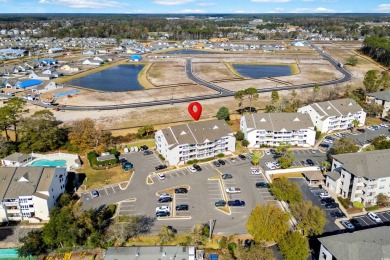 This efficiency condo is tucked away from the busy tourist scene on Beachwood Golf Club in South Carolina - for sale on GolfHomes.com, golf home, golf lot