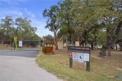 Experience breathtaking, million-dollar views of Lake Travis on Highland Lakes Golf Course in Texas - for sale on GolfHomes.com, golf home, golf lot
