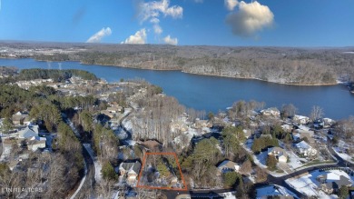 This charming basement ranch home offers a unique opportunity on Tanasi Golf Course in Tennessee - for sale on GolfHomes.com, golf home, golf lot