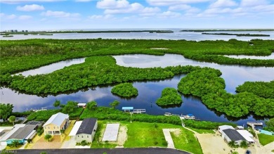 Build your dream home on this one-of-a-kind waterfront lot in on Pelicans Nest Golf Club in Florida - for sale on GolfHomes.com, golf home, golf lot
