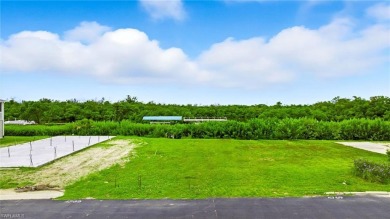 Build your dream home on this one-of-a-kind waterfront lot in on Pelicans Nest Golf Club in Florida - for sale on GolfHomes.com, golf home, golf lot
