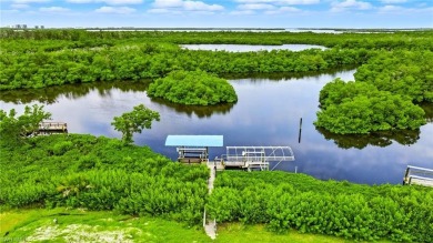 Build your dream home on this one-of-a-kind waterfront lot in on Pelicans Nest Golf Club in Florida - for sale on GolfHomes.com, golf home, golf lot
