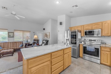 Are you looking for a cozy 2 bedroom home tucked away on a golf on Las Colinas Golf Club in Arizona - for sale on GolfHomes.com, golf home, golf lot