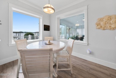 CUSTOM LAKE FRONT HOME WITH PRIVATE DOCK, BOATHOUSE FEATURING 6K on Sharks Tooth Golf Club in Florida - for sale on GolfHomes.com, golf home, golf lot