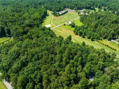 Approximately 1.25 acre gentle sloping lot with mountain views on The Rock At Jocassee in South Carolina - for sale on GolfHomes.com, golf home, golf lot