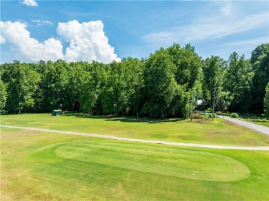 Approximately 1.25 acre gentle sloping lot with mountain views on The Rock At Jocassee in South Carolina - for sale on GolfHomes.com, golf home, golf lot