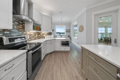 CUSTOM LAKE FRONT HOME WITH PRIVATE DOCK, BOATHOUSE FEATURING 6K on Sharks Tooth Golf Club in Florida - for sale on GolfHomes.com, golf home, golf lot