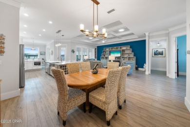 CUSTOM LAKE FRONT HOME WITH PRIVATE DOCK, BOATHOUSE FEATURING 6K on Sharks Tooth Golf Club in Florida - for sale on GolfHomes.com, golf home, golf lot