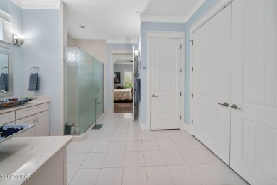 CUSTOM LAKE FRONT HOME WITH PRIVATE DOCK, BOATHOUSE FEATURING 6K on Sharks Tooth Golf Club in Florida - for sale on GolfHomes.com, golf home, golf lot