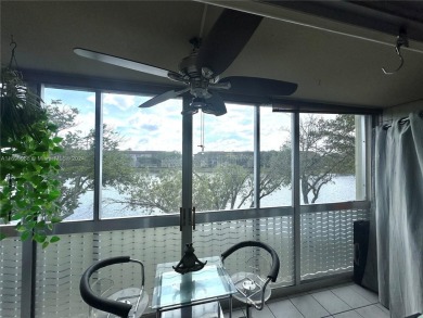 Spacious Magnolia corner unit with a lake view at Century on Flamingo Lakes Country Club in Florida - for sale on GolfHomes.com, golf home, golf lot