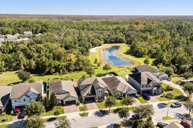 Beautiful 5 bed 3.5 bath 2-car garage craftsman in the highly on Harmony Golf Preserve in Florida - for sale on GolfHomes.com, golf home, golf lot