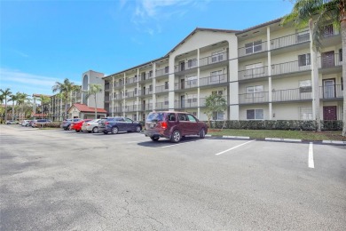 Spacious Magnolia corner unit with a lake view at Century on Flamingo Lakes Country Club in Florida - for sale on GolfHomes.com, golf home, golf lot