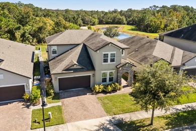 Beautiful 5 bed 3.5 bath 2-car garage craftsman in the highly on Harmony Golf Preserve in Florida - for sale on GolfHomes.com, golf home, golf lot